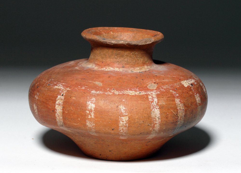 Nayarit Pottery Olla: Pre-Columbian, West Mexico, Nayarit, ca. 300 BCE to 300 CE. This is a narrow-necked, squat olla with cream linear designs. The shape of this piece is particularly pleasing to the eye. Size: 7" in diam