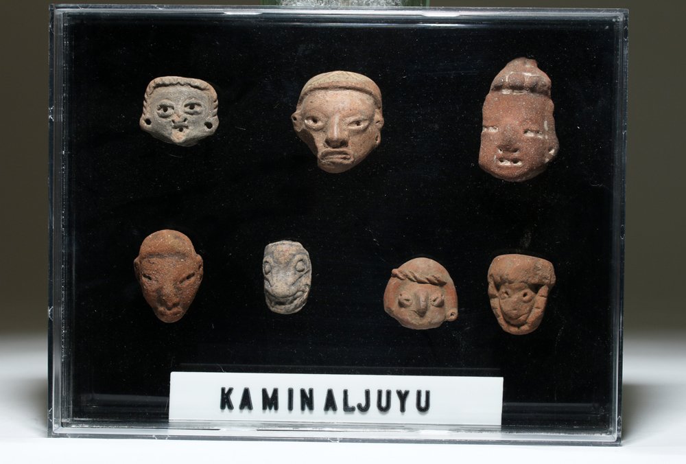 Seven Mayan Terracotta Heads from Kaminaljuyu: Pre-Columbian, Central Highlands, Guatemala, Kaminaljuyu, ca. 500 BCE to 1000 CE. A wonderful ensemble of Mayan ceramic heads with expressive visages and intricate detailing from Kaminaljuyu, Guatemal
