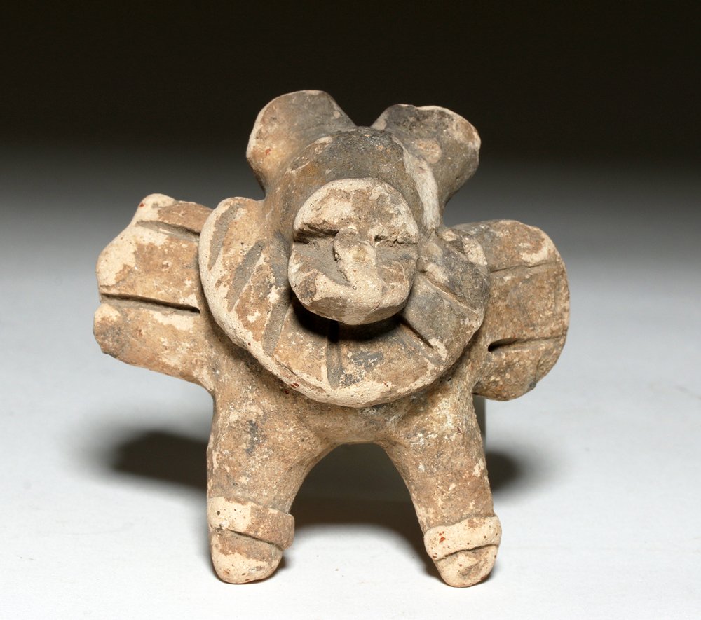 Veracruz Zoomorphic Pottery Whistle: Pre-Columbian, Mexico, Veracruz, ca. 100 to 1000 CE. This is a zoomorphic pottery whistle -- possibly in the shape of a bat? -- that is still able to be played. Size: 3-3/4" W x 3-1/2" H x 3" L (9-1/2