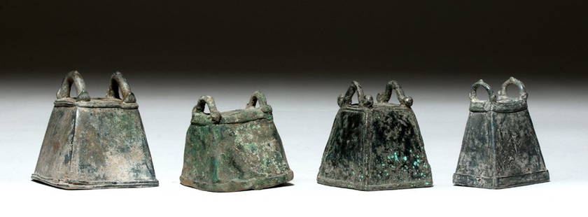 Dong Son Bells Bronze / White Metal, ex-Piscopo: Southeast Asia, Vietnam / Viet Nam, Dong Son culture, ca. 2000 BCE to 200 CE. Four cast ceremonial bells from the Dong Son culture of ancient Vietnam, each with twin decorative handles, the shortest