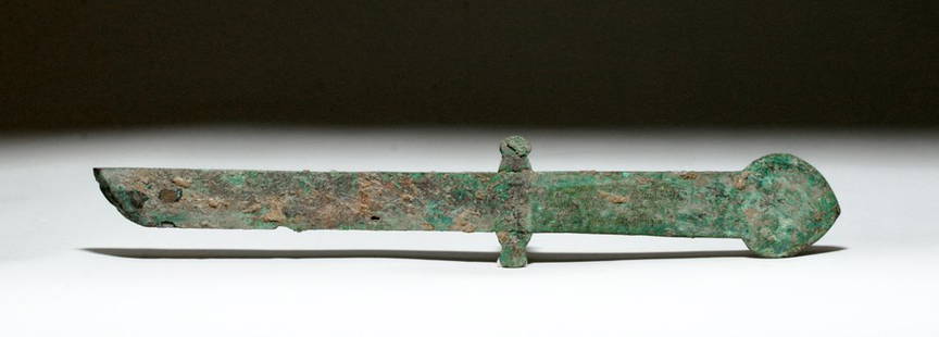 Chinese Han Dynasty Bronze Knife (Dao), ex-Piscopo: China, Han Dynasty, 206 BCE to 220 CE. This is a bronze knife, known as a dao, with blade, guard, and tang; it is missing its perishable handle. The tang ends in a clover shape; the guard has a