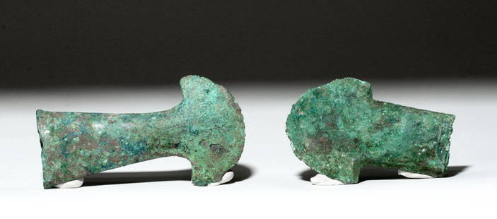 Pr Chinese Shang Bronze Yue Ax Heads, ex-Piscopo: China, probably Shang Dynasty, ca. 12th to 11th century BCE. These are two bronze "yue" axe heads, with wide flattened blades flaring towards their curved cutting edges. Both are socketed; one has a