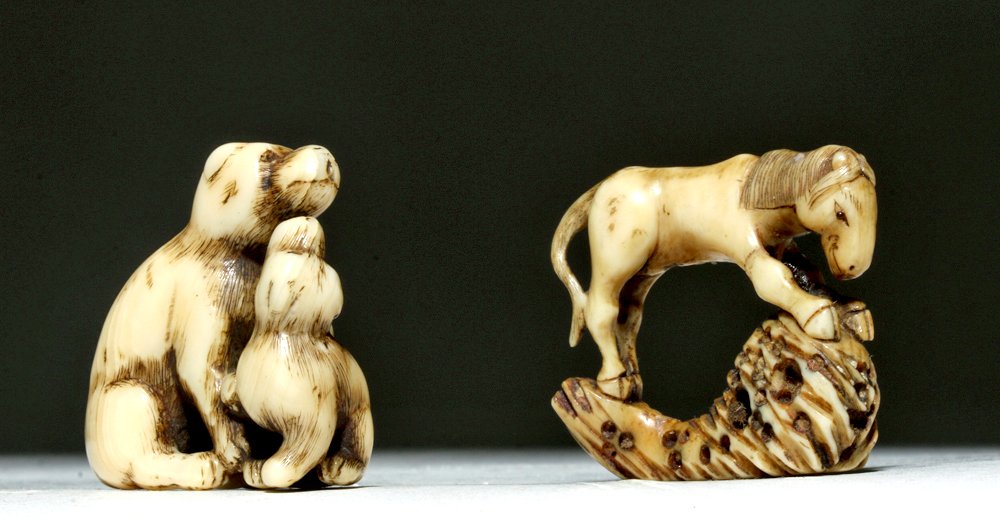 Pair Antique Japanese Ivory Netsuke - Horse & Monkeys: Far East, Japan, Meiji Period / Meiji Era to early 20th century CE. This pair of netsuke, made of African ivory, is probably from the earlier part of the listed range; the animals lack the perfect rea