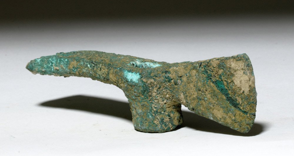 Marlik Bronze Adze / Axe Head, ex-Piscopo: Marlik, ancient Iran, ca. 2000 to 1600 BCE. This is a cast bronze socketed adze/axe head from one of Iran's most famous Bronze Age archaeological areas, between the Elburz Mountains and the southern s