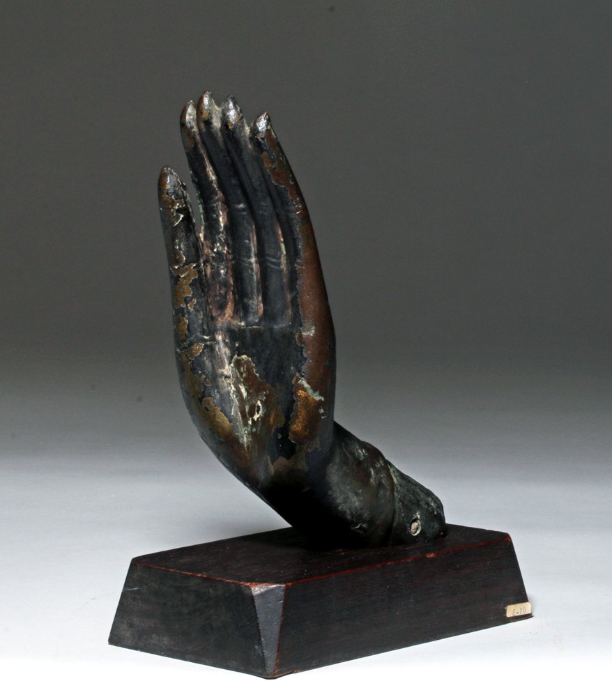 Large Thai Bronze Buddha Hand: Southeast Asia, Thailand, ca. late 19th century to early 20th century. This is a bronze hand in the traditional Abhaya Mudra, the gesture of protection with the hand pointing upwards. Buddhist hand sy