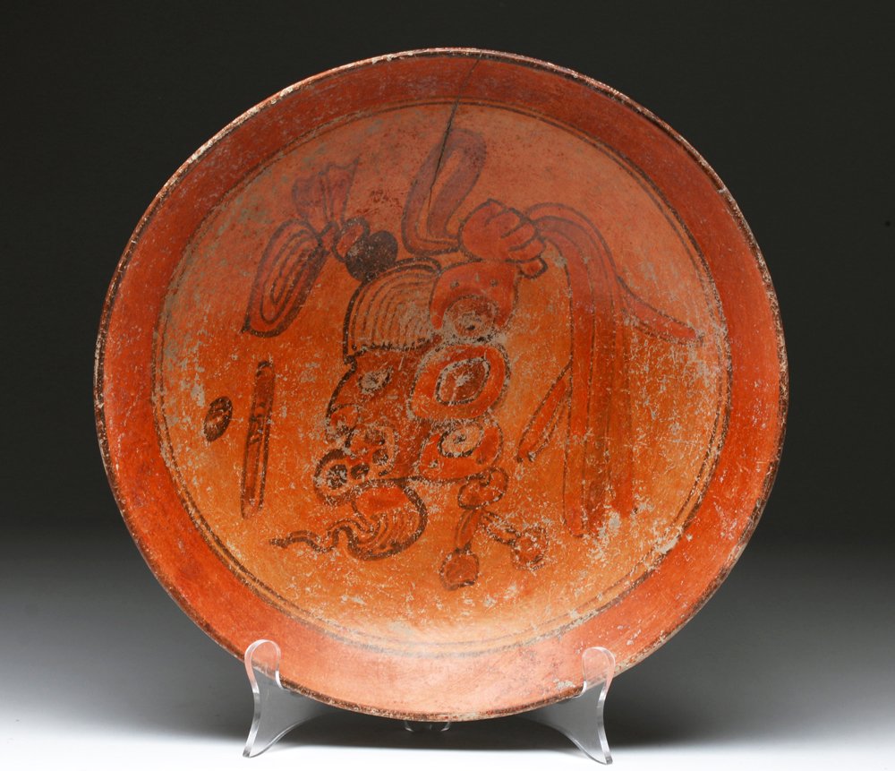 Mayan Polychrome Plate w/ Glyphs: Pre-Columbian, Mayan, ca. 600 CE to 900 CE. A large Pre-Columbian Maya polychrome plate. The glyphs on this plate are most likely calendrical in nature, representing the elaborate ways in which the an