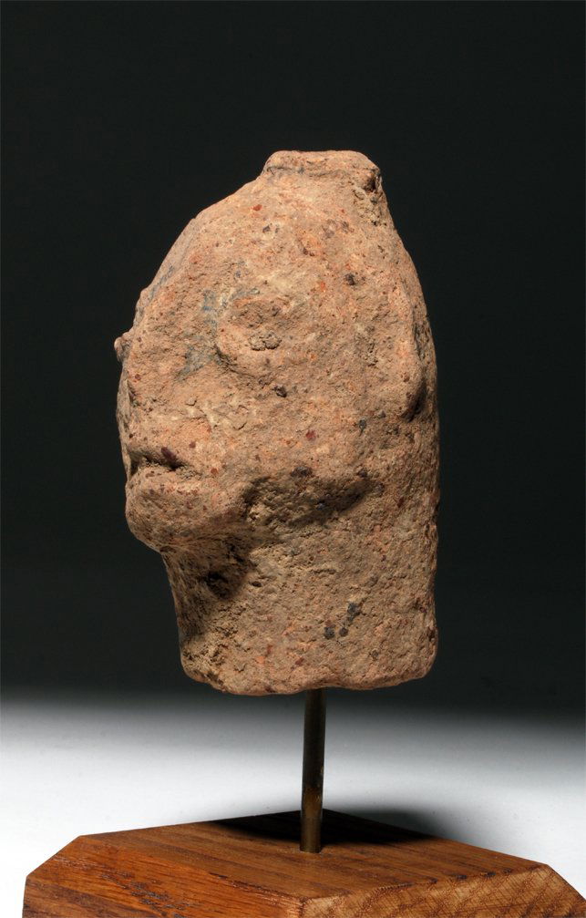 Ancient African Nok Terracotta Head - Ex Malter: West Africa, Central Nigeria, ca 500 BCE to 200 CE. A carved terracotta head created by this ancient African culture. This terracotta example is made of a coarse, quartz-tempered clay. The features we