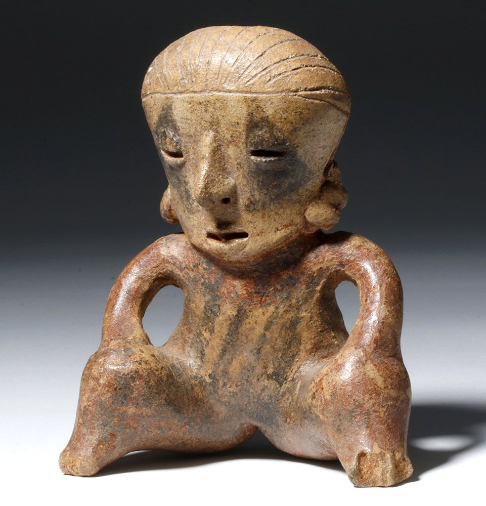 Chinesco Polychrome Seated Female Figure: Pre-Columbian, West Mexico, Nayarit, Chinesco, Ca. 200 BCE to 200 CE. A handsome seated terracotta figure in the Chinesco style - representing some of the most desirable West Mexican pottery available