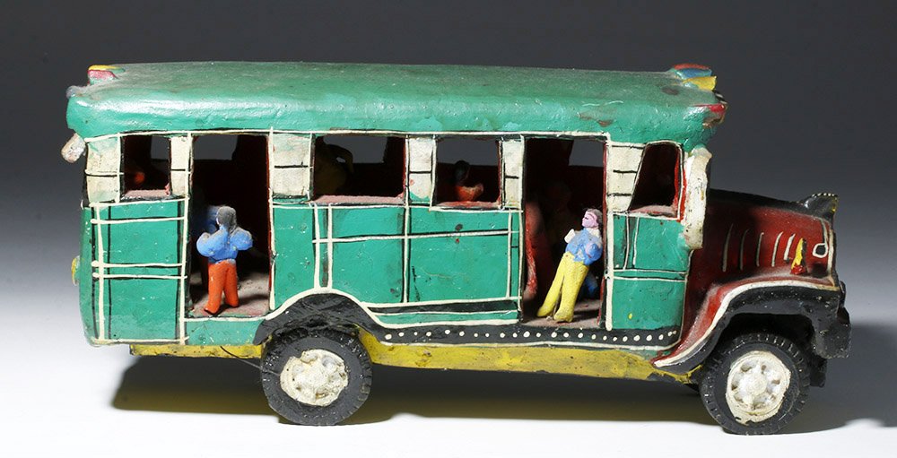 Adorable 1950s Mexican Pottery Bus: ** A portion of the proceeds from the sale of this lot will benefit The Fowler Museum at UCLA ** Mexico, ca. 1940 to 1950. Large pottery bus painted green with red hood and “Toluca” painted on the