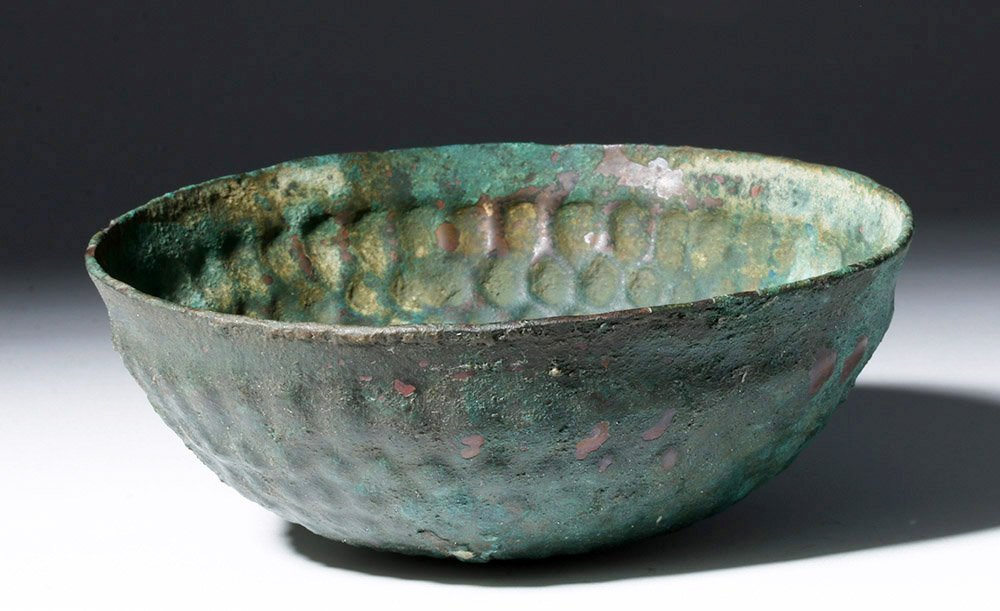 Superb Luristan Bronze Bowl - Stipled Design: Northwestern Iran, Luristan culture, ca. 900 to 700 BCE. Gorgeous deep bronze bowl decorated with repeating rows of dimples - looking somewhat like a modern golf ball. Six rows of dimples decreasing i