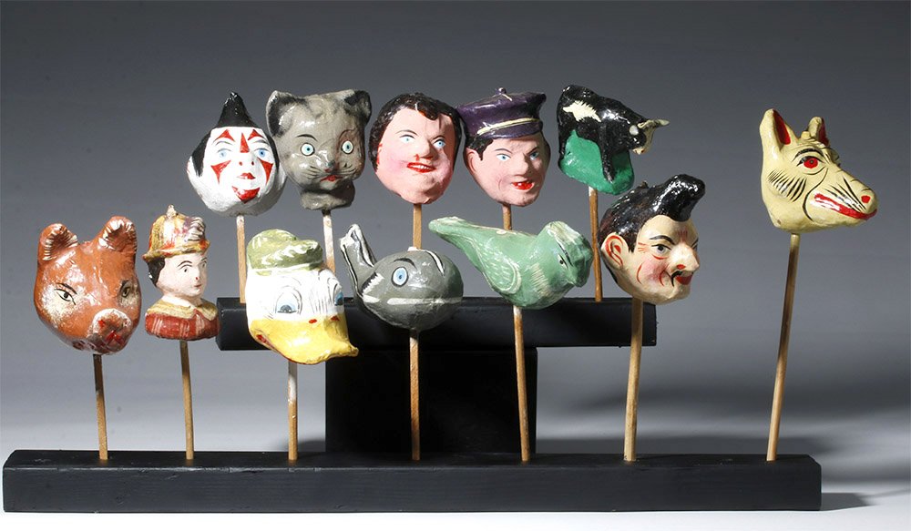 20th C. Mexican Papier Mache Rattles (group of 12): ** A portion of the proceeds from the sale of this lot will benefit The Fowler Museum at UCLA ** Mexico Celaya, Guanajuato ca. 1970 - 1980. Rattles (sonajas) Eleven painted papier-machè heads of anim