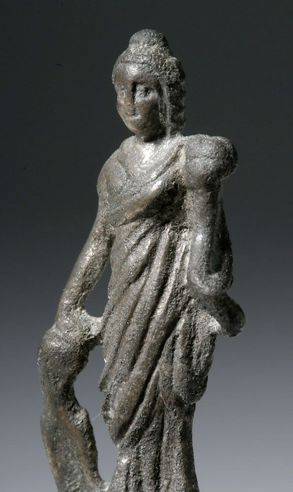 Roman Silver Hairpin Depicting Fortuna: Ancient Rome, ca. 2nd to 4th century CE. A very rare silver hairpin depicting Fortuna, the goddess of fortune and the personification of luck, whether that luck be good or bad, for the ancient Romans.