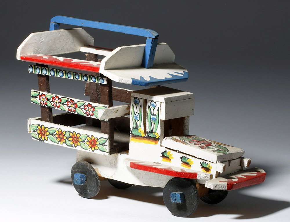 1960s Haitian Painted Painted Wood 'Tap Tap' Truck: ** A portion of the proceeds from the sale of this lot will benefit The Fowler Museum at UCLA ** Haiti, ca. 1960s CE. This is a nice piece of folk art, a wooden "tap tap", a brightly painted bus used 