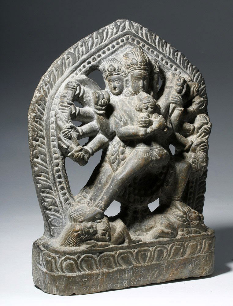 16th C. Indian Blackstone Trimurti / Dattatreya: India, Post Indus Valley Period, ca. 16th century CE. A fine Trimurti sculpture, hand carved from a single piece of grey-black stone, the sacred trinity representing the supreme deity of Hinduism - in