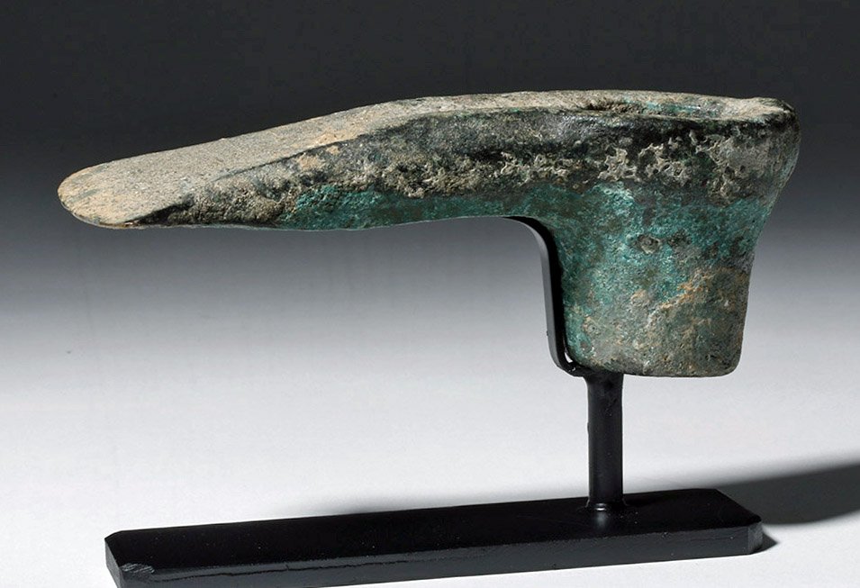 Near East Bronze Adze w/ Gorgeous Patina: Ancient Near East, ca. 1700 BCE. This is a round-socketed cast bronze adze blade, nominally a wood working tool, but probably made also to be used as a sign of wealth and prestige and a burial good. T