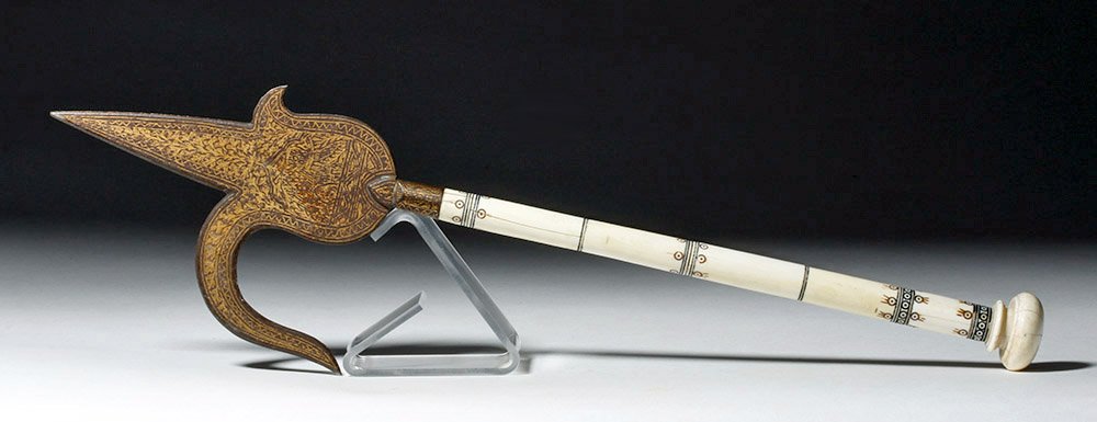 19th C. Indian Gilded Iron Prestige Ankus: India, 19th century CE. An "ankus", or "ankusha", also known as a bullhook or elephant goad, modeled from a tool used for the handling and training of elephants, but here a ceremonial prestige item. A