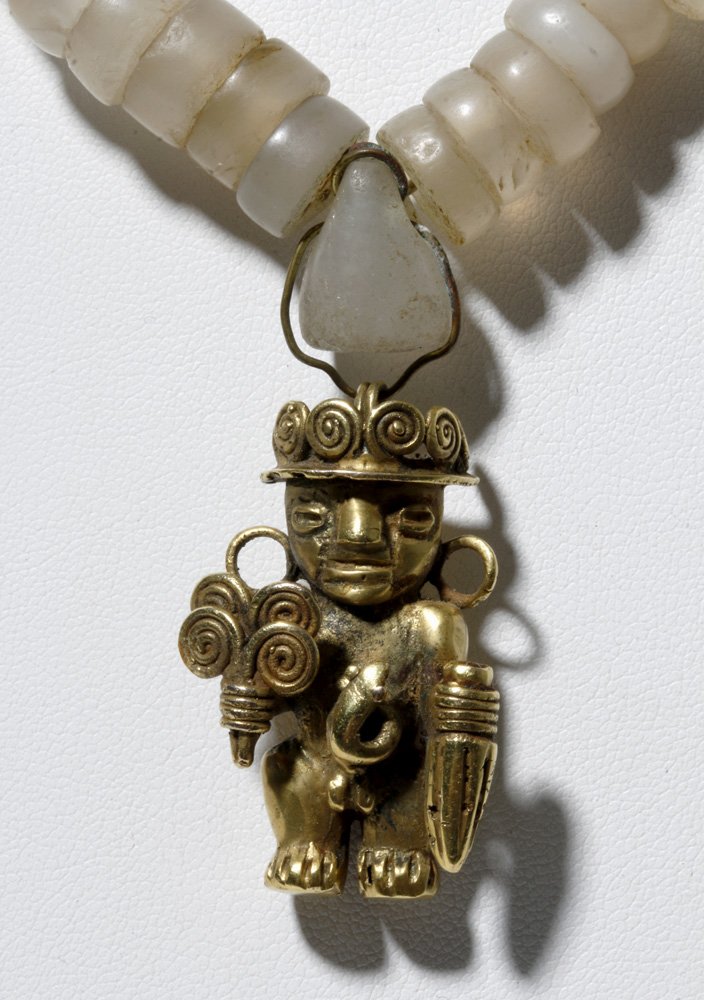 Tairona 22K+ Gold Pendant / Rock Crystal Necklace: ** A portion of the proceeds from the sale of this lot will benefit The Fowler Museum at UCLA ** Pre-Columbian, Colombia or Venezuela, Tairona culture, ca. 900 to 1200 CE. Wonderful long necklace comp