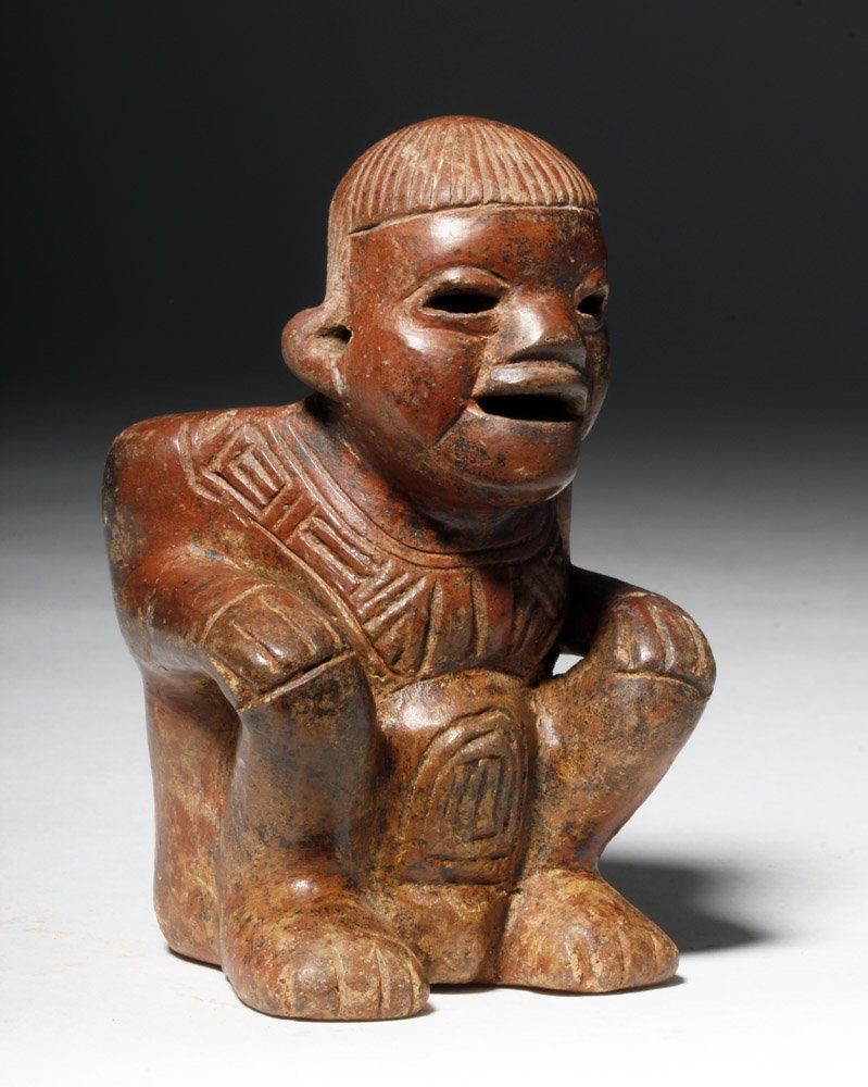 Calima Seated Figure w/ Basket - "Canastero": Pre-Columbian, Colombia, Calima people, ca. 100 BCE to 800 CE. A seated figure vessel in the form of a male with his hands on his knees and a basket - forming the vessel portion of the figure - on his