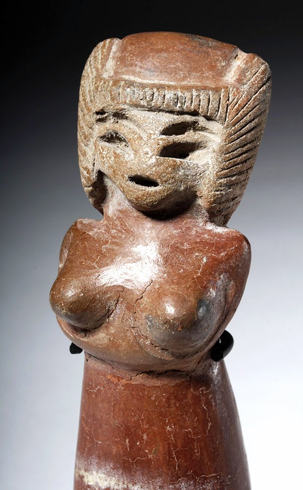 Large Valdivian Pottery Venus Figure: Pre-Columbian, Ecuador, Valdivian, ca. 3500 to 1500 BCE. An elegant standing terracotta "Venus" figure, mold-made and finely detailed with an expressive visage comprised of delicately incised features