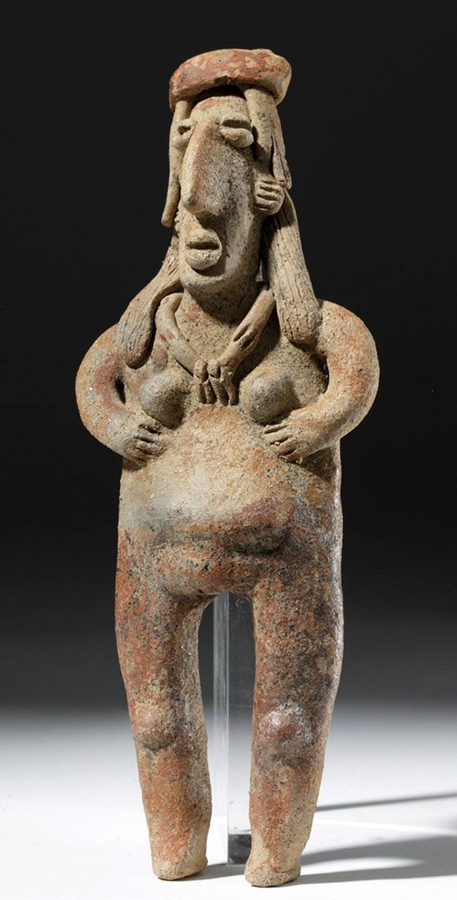 Detailed Jalisco Flat Pottery Pregnant Female: Pre-Columbian, West Mexico, Jalisco, ca. 300 BCE to 300 CE. A flat pottery figure (although with details fully around the body) from the West Mexican shaft tomb culture. This is a portrayal of a stand