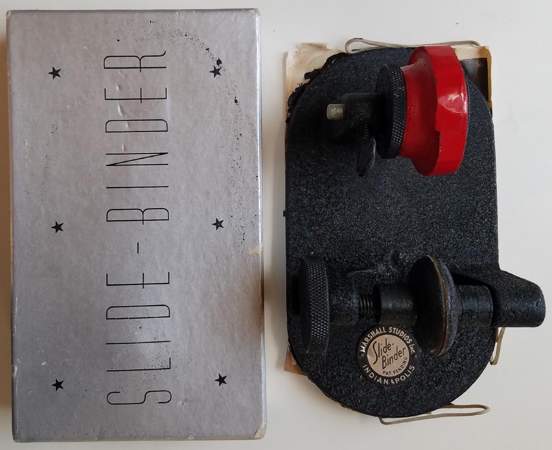SLIDE BINDER ORIGINAL BOX 100s OF SLIDES PHOTO BOXES: Slide-binder in its original box in good condition. Hundreds of slides, both glass and celluloid. Many many locations include Bar Harbor, Seal Island, Grenada, Antigua, Spain.Â Original Leica box wi