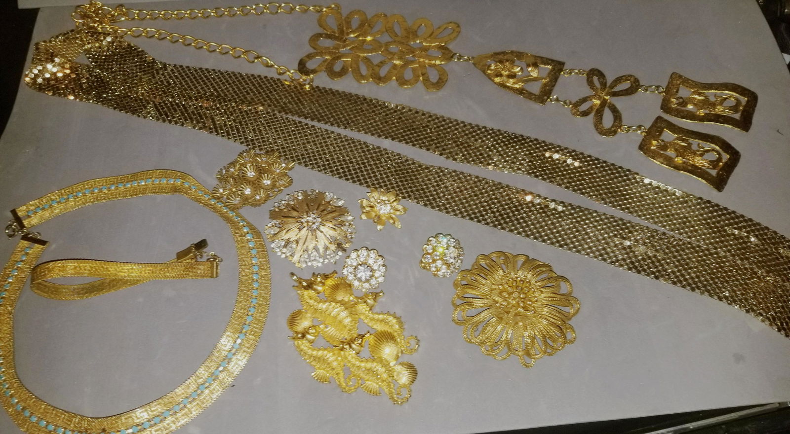 Vintage Gold Tone Jewelry Lot: Gold Tone Brooches, Necklaces Etc. Condition Good