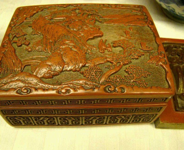 Lot of 2 Chinese Pieces: cinnabar covered box and wood carved wall plaque Condition vg/g