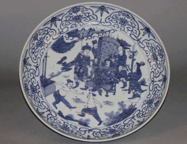 Blue And White Plate: porcelain plate, china,19c, decorated with chinese war story. 4" h x 17.5" Condition g