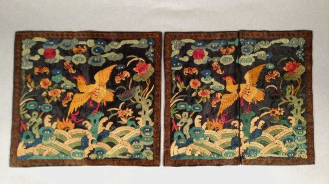 Chinese Embroidery: a pair of officer rank badges depicting bird flying above the see. Decorated with bats and sea pattern 12" x 7" Condition g