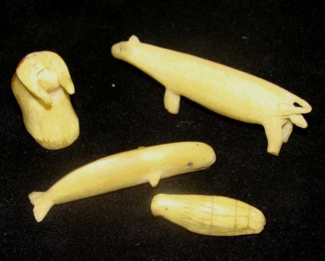 Grouping of Bone Inuit Miniature Animals: grouping of 4 primitive miniature animals, walrus, whale, etc. 1" - 2.25" Condition vg/g
