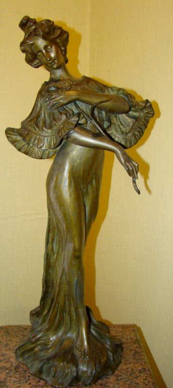 Art Nouveau Lady Lamp, Iris: signed in two places, 28.5" Condition missing flower shade