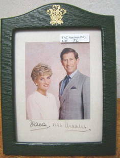 Signed Autograph of Princess Diana and Charles: Buckingham Place; housed in original green leather frame with a gold embossed Prince of Wales crest 9.5"x 7" Condition vg/g