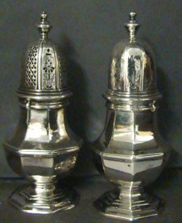 Pr. Sterling Silver Castors George ll London 1730: hallmarked, octagonal, 4.65ozt. and 4.85 ozt., 5.25" Condition a few dings interior lip of 1 castor