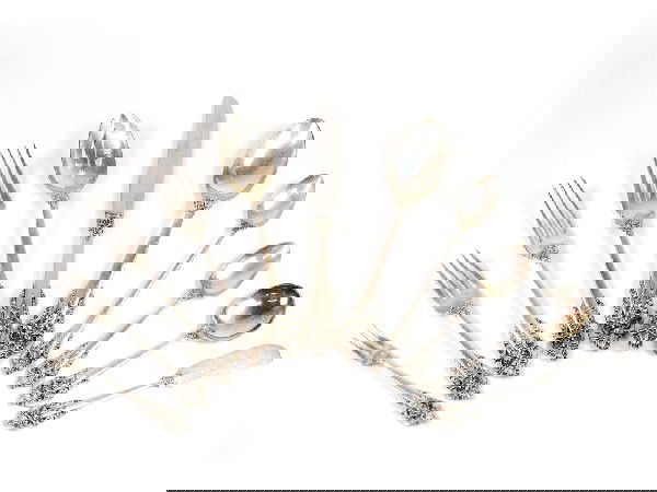 WALLACE GRANDE BAROQUE STERLING FLATWARE FOR 12: A COMPLETE STERLING SILVER FLATWARE SERVICE FOR TWELVE WITH SERVING PIECES Wallace Silversmiths, Inc., Connecticut, designed 1941 The complete "Grande Baroque" service for twelve, designed by William