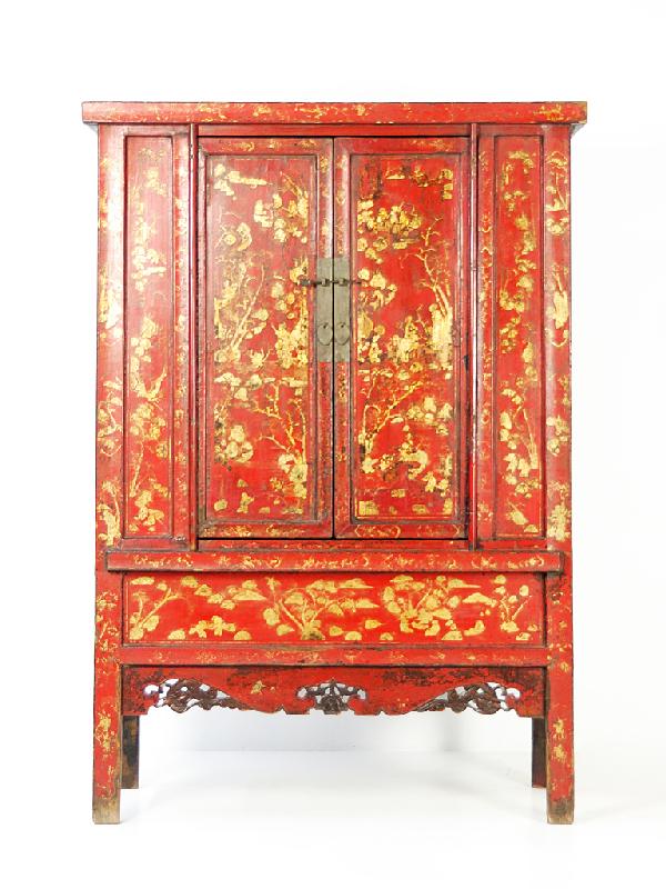 AN ANTIQUE CHINESE HAND-PAINTED CABINET Nineteenth: AN ANTIQUE CHINESE HAND-PAINTED CABINET Nineteenth Century The finely painted red cabinet with yellow detail, two doors and removable panels revealing additional storage, below, one drawer leading to