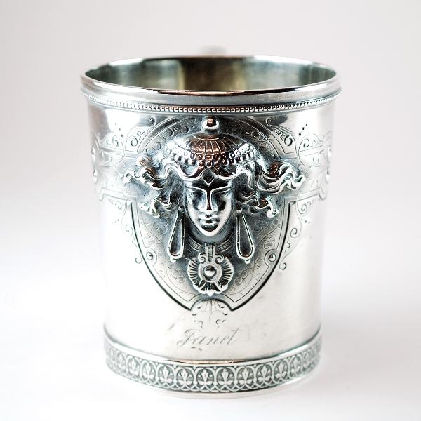 A STERLING ENGLISH-STYLE CUP Ball, Black and Compa: A STERLING ENGLISH-STYLE CUP Ball, Black and Company, New York, NY, Manufactured, Circa 1851-1876 The cup engraved "Janet" beneath high style raised female portrait with beading pattern to lip of cup