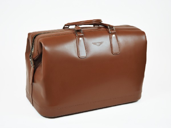 A BENTLEY LEATHER DAY TRAVELER: A BENTLEY LEATHER DAY TRAVELER Exclusive from the Bentley Collection 13 x 18 1/2 x 10 1/4 inches