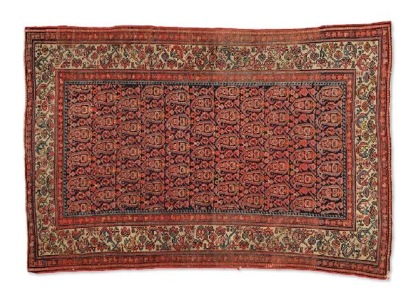 A MALAYER CARPET, Northwest Persia, Circa Early Tw: A MALAYER CARPET Northwest Persia, Circa Early-Twentieth Century Highly desirable navy blue field, this impressive sampler all over design with Boteh or better know as Paisley design exhibits a delica