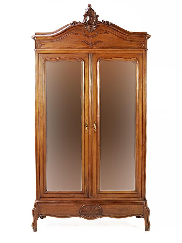 A LOUIS XV WALNUT ARMOIRE France Nineteenth Centur: A LOUIS XV WALNUT ARMOIRE France Nineteenth Century beveled mirrors 100 x 50 x 18 inches