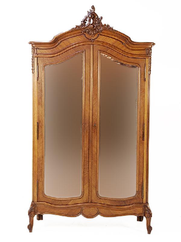 A LOUIS XV WALNUT ARMOIRE France Nineteenth Centur: A LOUIS XV WALNUT ARMOIRE France Nineteenth Century beveled mirrors 96 x 55 x 15 inches
