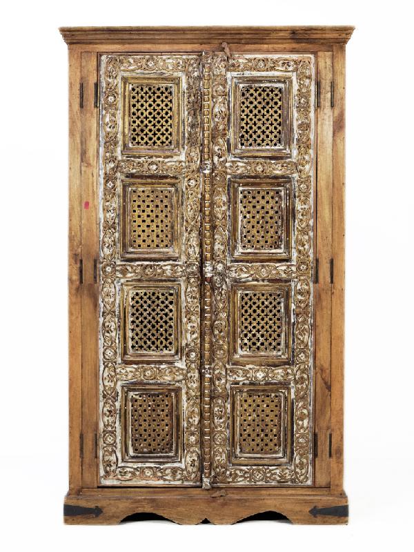 A RUSTIC ARMOIRE: A RUSTIC ARMOIRE with painted, carved, and pierced door panels 82 x 48 x 28 inches