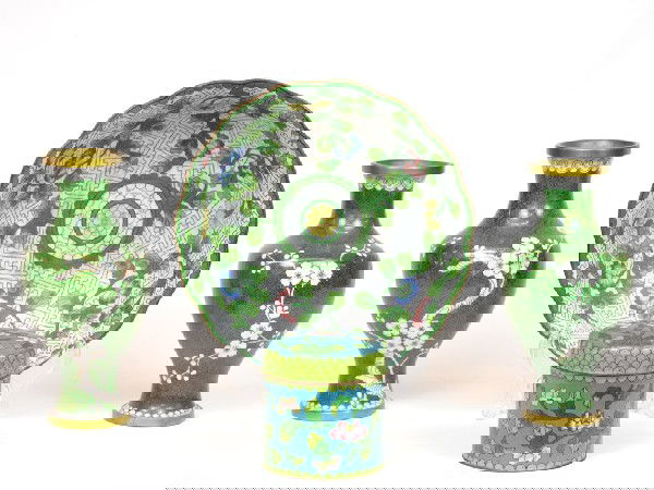 A GROUP OF GREEN CLOISONNE PIECES: A GROUP OF GREEN CLOISONNE PIECES including: a scalloped bowl showing a white "maze" background with green floral motif, measuring 2 3/4 x 8 inches, two matching green vases with white floral design,
