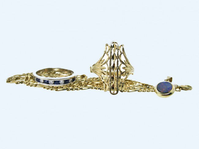 A MIXED LOT OF 14K JEWELRY: A MIXED LOT OF 14K JEWELRY consisting of a White Gold Sapphire and Diamond wedding band with 1/3 Carat of gem weight, size 6 ½, a 14K diamond cut cigar band ring, size 8, a 20" Figaro link chain, an