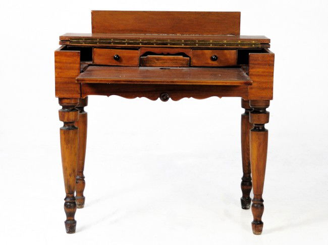 AN OAK FLIP TOP DESK: AN OAK FLIP TOP DESK with interior drawers 33 1/2 x 38 x 19 inches