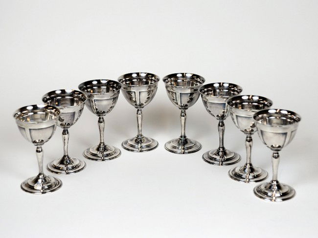 A SET OF EIGHT REED AND BARTON ART DECO STERLING WI: A SET OF EIGHT REED AND BARTON ART DECO STERLING WINE GOBLETS with stamped signature, marked " 4070" and stamped with torch emblem 4 1/2 x 2 1/2 x 2 1/2 inches