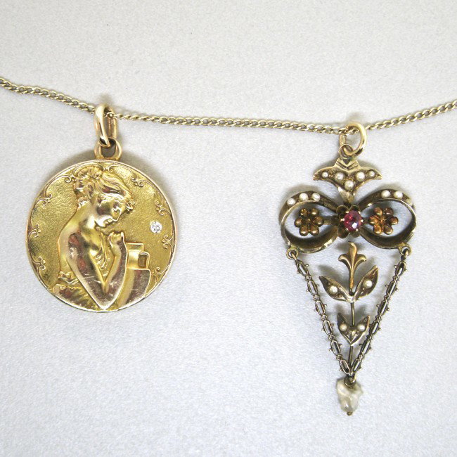ONE LOT CONSISTING OF TWO PENDANTS WITH ONE CHAIN: ONE LOT CONSISTING OF TWO PENDANTS WITH ONE CHAIN A 14K gold Victorian style locket of a lady in yellow gold with one circular cut diamond=.03 Ct. script monogram hand engraving on the reverse " gAc" 