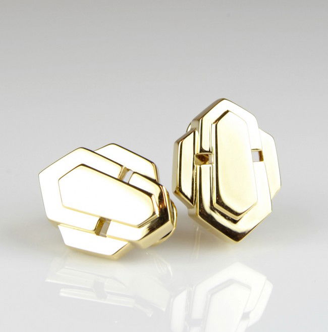 18K BOLD FACE EARRINGS BY DAVID WEBB: 18K BOLD FACE EARRINGS BY DAVID WEBB In yellow gold, non-pierced clip measuring 5/8" x 7/8 ". Weighing 16.3 Grams.