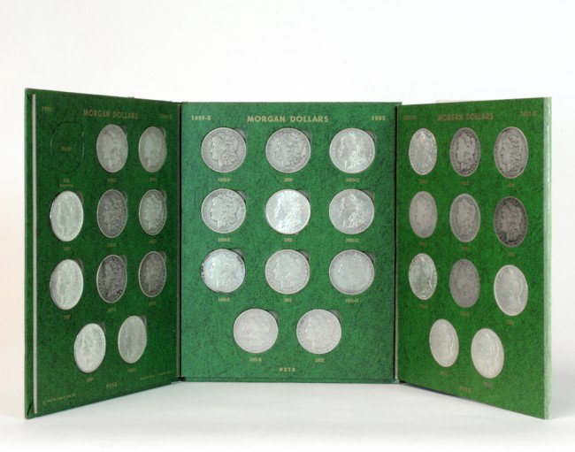 1895-1921 U.S. MORGAN SILVER DOLLARS - Whitman book: 1895-1921 U.S. MORGAN SILVER DOLLARS - Whitman book 9213, 32 coins total, no 1895 proof.