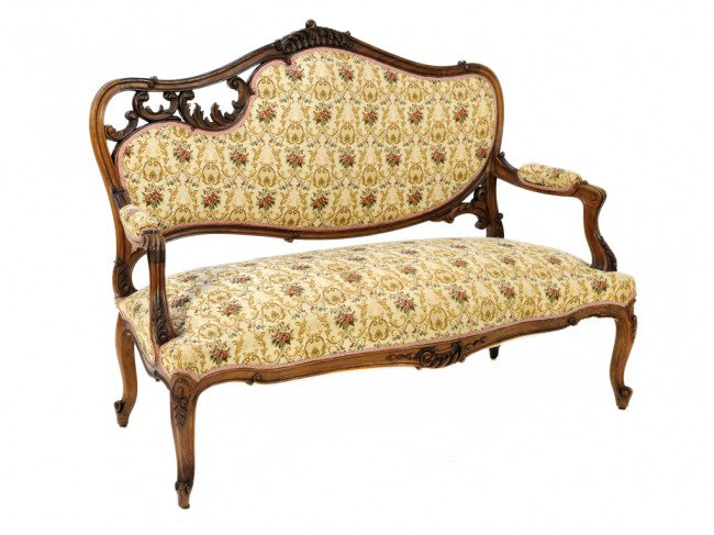 A LOUIS XV WELL CARVED WALNUT SETTEE, French: A LOUIS XV WELL CARVED WALNUT SETTEE, French C- scroll and shell detail, tapestry upholstered, exposed frame. 41 1/2 x 53 x 23 inches