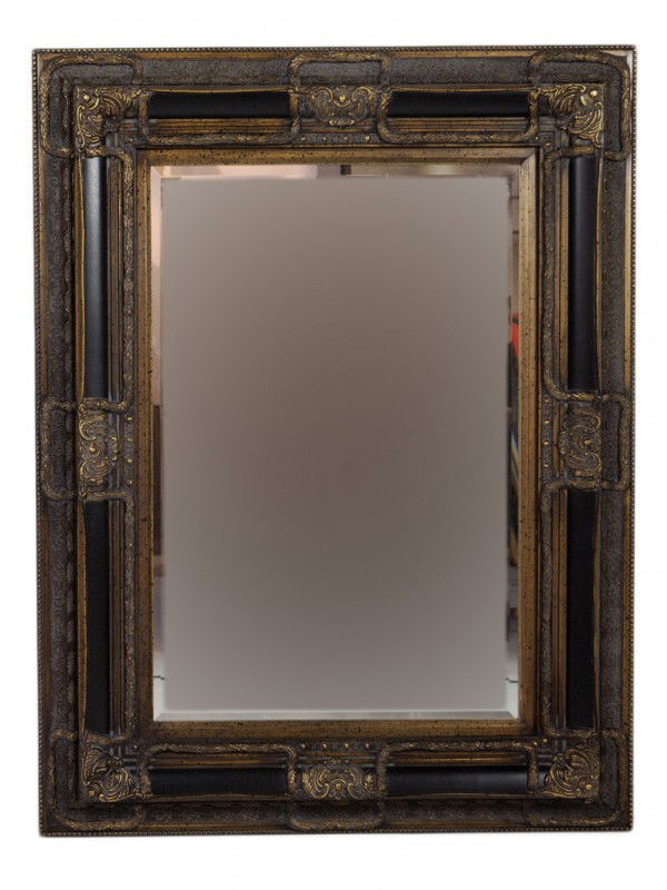A LARGE BEVELED GLASS WALL MIRROR: A LARGE BEVELED GLASS WALL MIRROR in antiqued gilded and patinated bi-level frame with interwoven wreath carved detail and beaded trim 50 x 38 1/4 x 2 1/2 inches